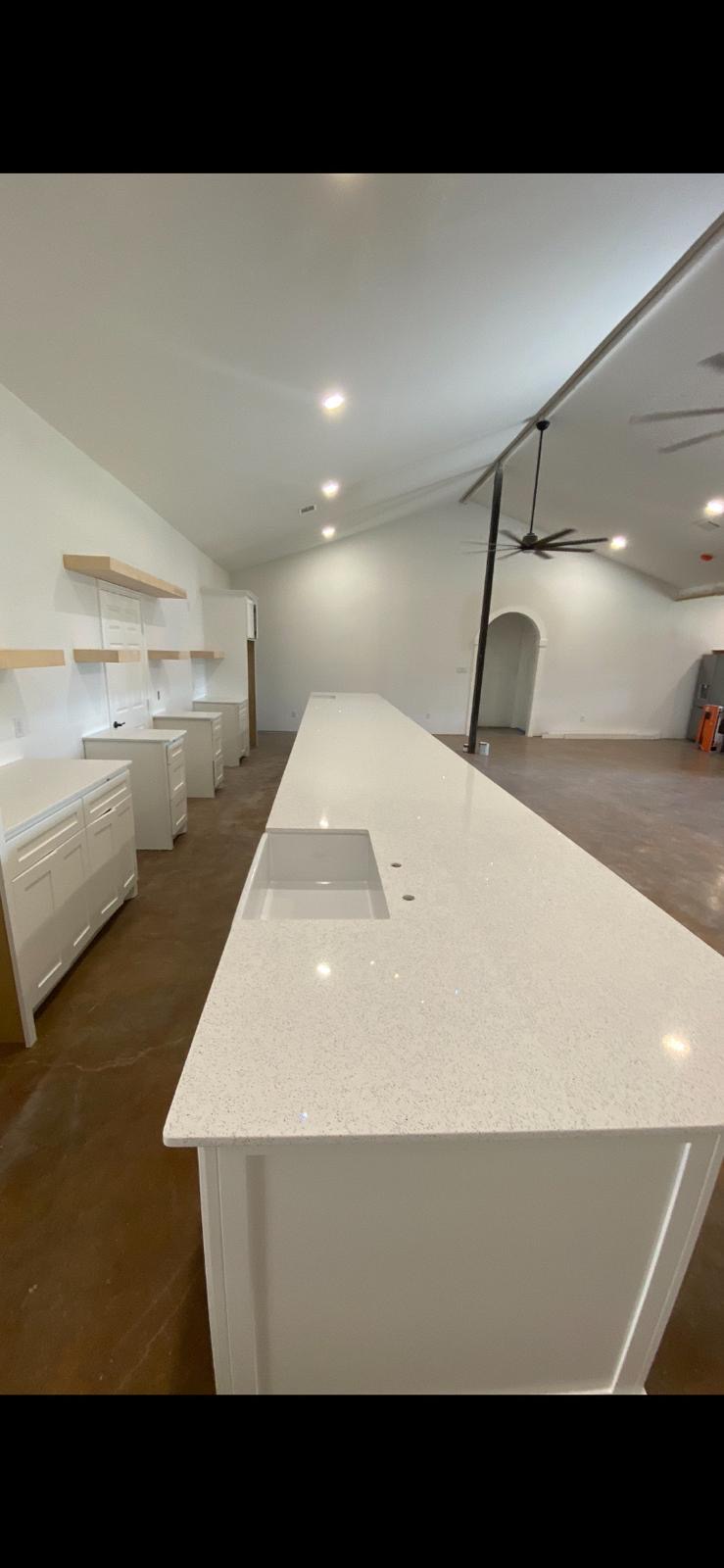 Long outdoor bar counter in stone