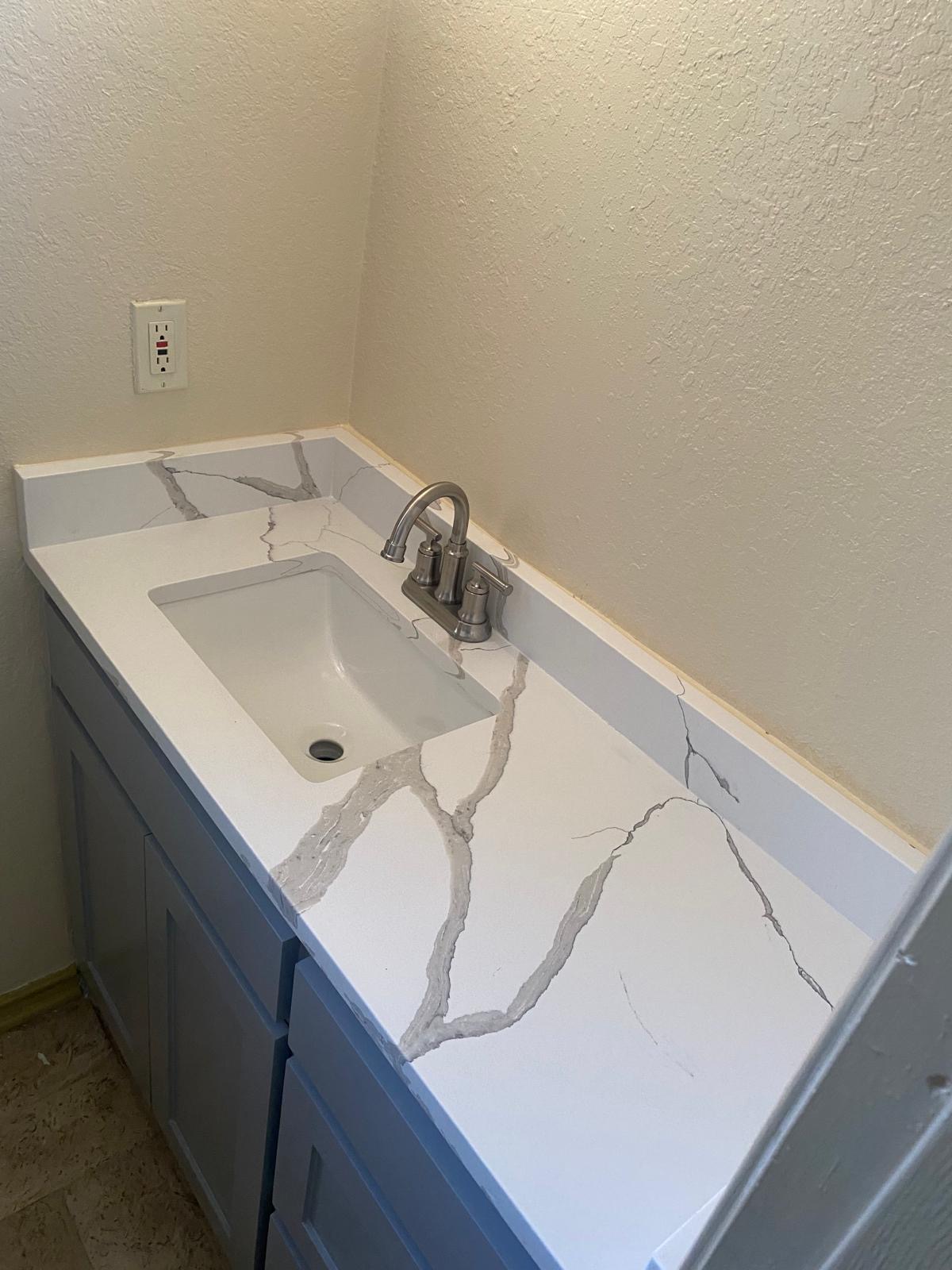 Vanity countertop with bold stone veining